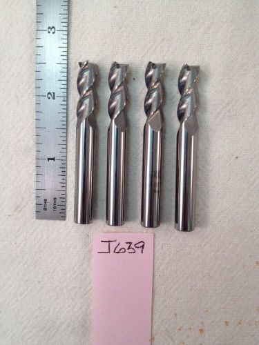 4 NEW 8 MM SHANK CARBIDE END MILLS. 3 FLUTE. CUT DIA MAY VARY. USA MADE {J639}