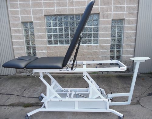 Dynatronic 3 secton hi/low elevation table with traction stand for sale