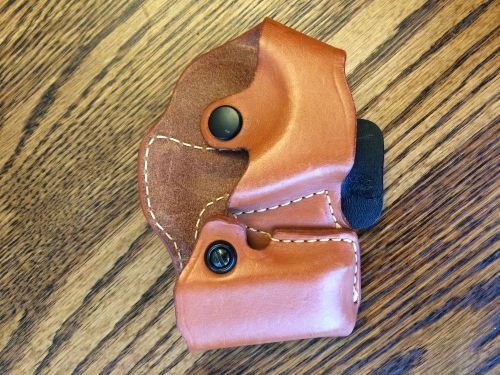 leather handcuff and magazine holster