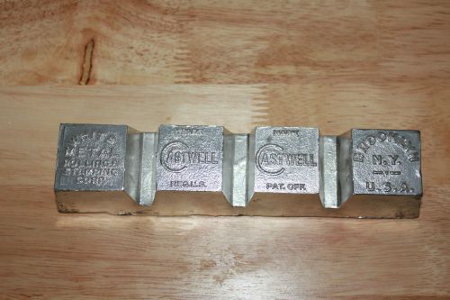 Vintage Paper Weight  Stamping Castwell White Metal Rolling Corp Brooklyn NY USA