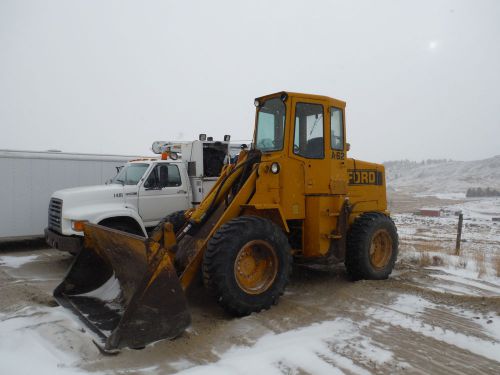A-62 FORD   WHEEL LOADER    new engine less than 300hrs