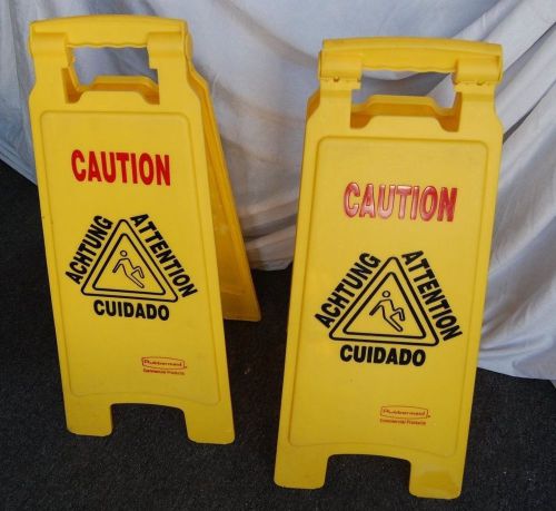 (2) Rubbermaid Item 6112 - Caution Wet Floor Signs - German, Spanish &amp; English