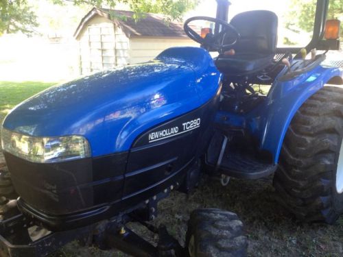New holland tc29d tractor with woods rm600 finish mower for sale