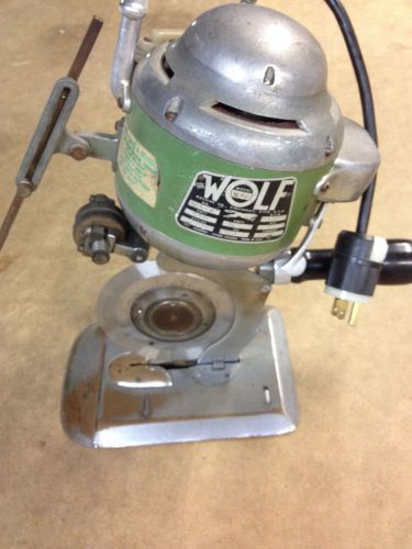 The Wolf Machine Company industrial fabric rotary cutter