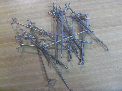 Hooks used on  3/16 and 1/4 inch peg board 25 pieces  7 inch length ball end for sale