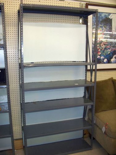 All steel heavy duty 6 ft. tall adjustable shelf racks heavy duty nice condition for sale