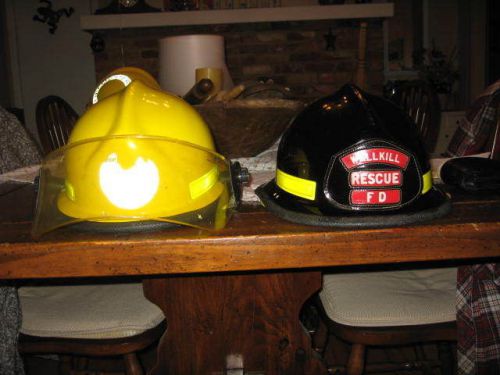 (2)fire helmets   yellow cairns and black cairns for sale