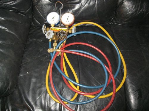 Set of Ritchie Yellow Jacket gauges with 4 valve manifold and hoses