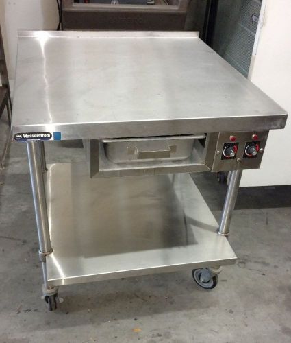 STAINLESS STEEL WORKTOP TABLE WITH FULL SIZE WARMING DRAWER ON CASTERS