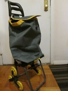 Folding Climb Cart that climbs stairs with ease. Includes jumbo carry bag and bu