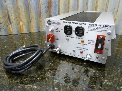 Tripp lite sb-1000a 1000watt dc to ac power inverter &amp; regulated battery charger for sale
