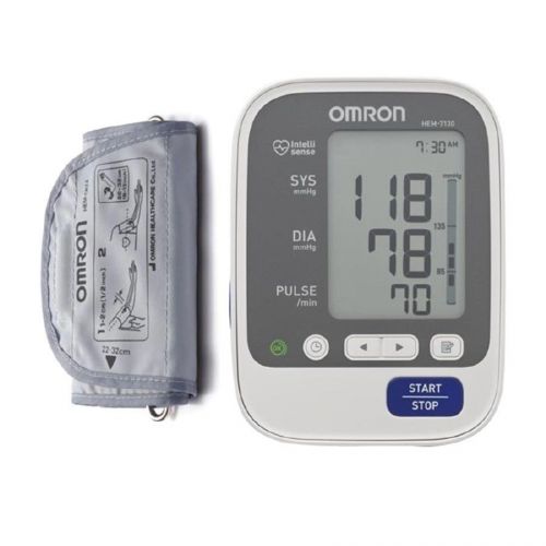 Omron automatic blood pressure monitor hem 7130 upper arm with regular cuff for sale