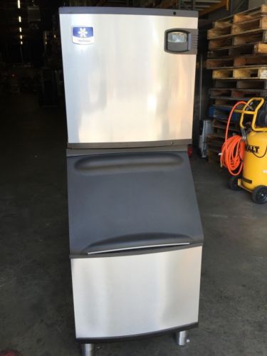 MANITOWOC COMMERCIAL ICE MACHINE MAKER W/BIN