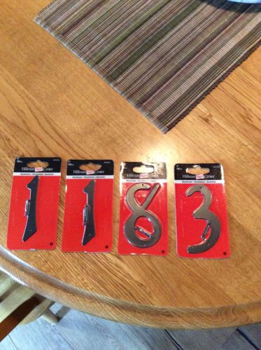 Aluminum numbers made by Hillman sign center