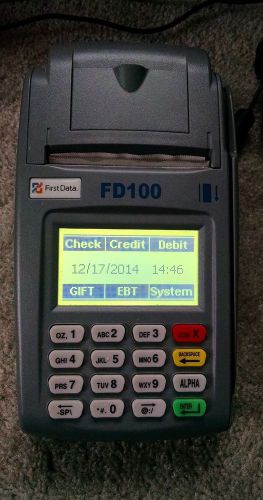 First data fd-100 credit card terminal, powers on! for sale
