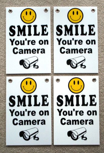 (4) SMILE YOU&#039;RE ON CAMERA Coroplast Outdoor  SIGNS 8&#034;x12&#034;  w/Grommets  NEW