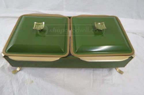 Dual side by side footed serving pans each has a separate lid. Can use for food