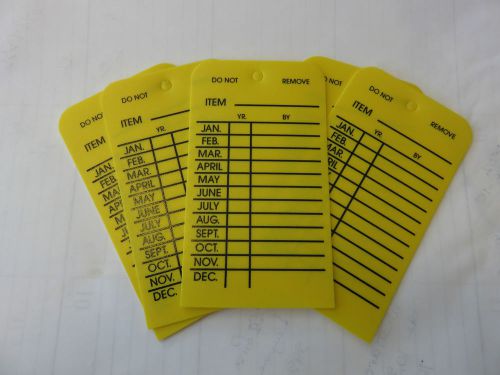 10-H.D. PLASTIC MONTHLY INSPECTION TAGS HIGH-DENSITY YELLOW INDOOR/OUTDOOR USE