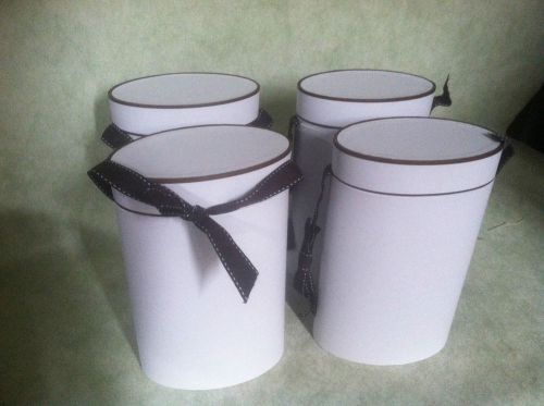 three Unique tall oval Gift Boxes