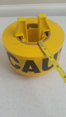Large Yellow CAUTION tape roll  professional,  or halloween decor use