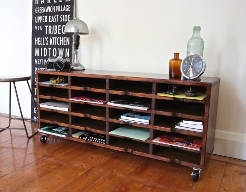 Industrial vintage 20 shelf filing document unit with swivel wheels, side table for sale