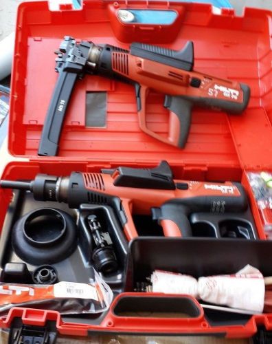 TWO HILTI DX 76  POWDER ACTUATED FASTENING TOOLS W/ MX 76 PTR MAGAZINE