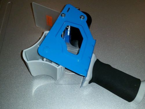 Tape gun with 3 inch blade and comfort grip.