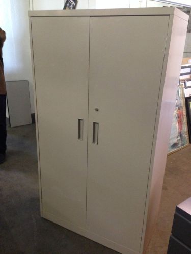 Metal storage cabinet by steelcase office furn w/lock&amp;key 65&#034;h for sale