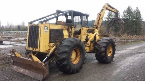1977 caterpillar 518 log skidder with swing grapple for sale
