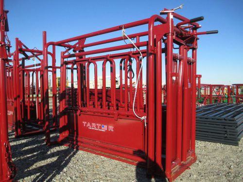 Unused tartar cattle master squeeze chute, automatic head gate, drop down sides for sale