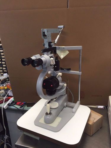 Carl Zeiss 100/25 Slit Lamp w/ HS Applanation Tonometer, table and power supply.