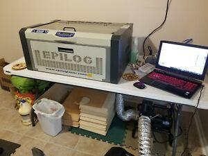 Epilog Laser Mini Helix 24 - 8000 Model - 50 Watt  laser engraver cutter 24”x12”