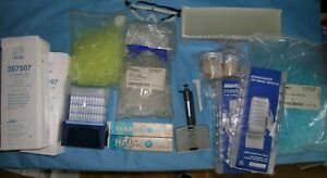 Assorted Lab Bench Leftover, Multichannel pipette, tips, glass tubes, pipettes
