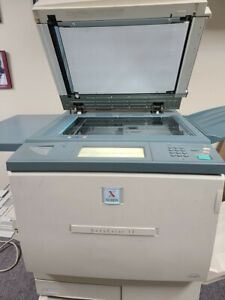 xerox docucolor 12 (USED) w/ Fiery AND 34 NEW boxes of supplies 