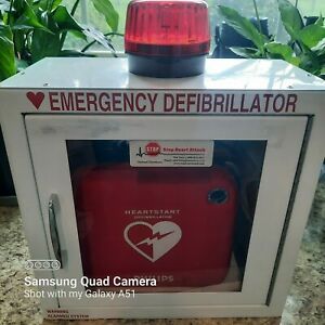 EMERGENCY DEFIBRILLATOR, EXPIRED, NEVER USED IN METAL CASE, NEEDS NEW BATT, NEW
