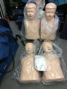 4x LAERDAL LITTLE JUNIOR CHILD CPR MANIKIN TRAINER FIRST AID NURSING &amp; BAG
