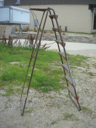 Vintage industrial fold out metal ladder 7 steps steampunk photo prop for sale