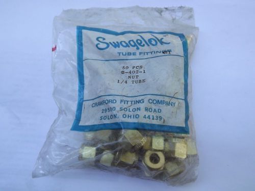 Swagelok b-402-1 brass nut for 1/4 inch swagelok tube fitting lot of 50 new for sale
