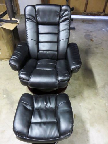 Contemporary Black Leather Recliner and Ottoman with Swiveling Mahogany Wood Bas