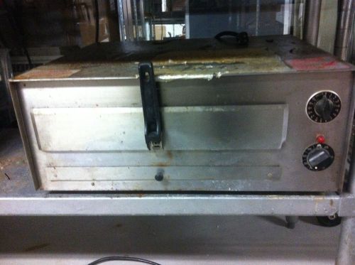 Wisco industries JJ560 counter top pizza oven used