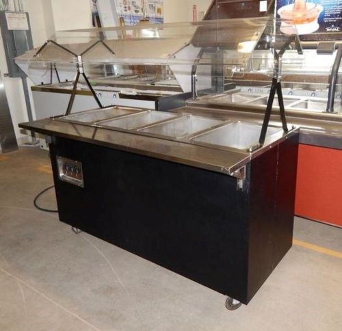 Vollrath 4 well steam table; double sided sneeze guard; on casters; model: 38710 for sale