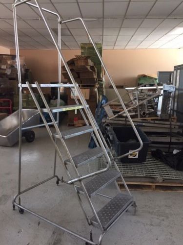 Warehouse ladders on wheels / six  steps 60&#034; high / 24&#034; wide for sale