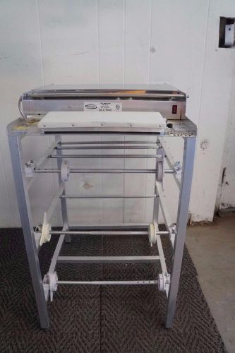 Win holt 3 roll wrapping machine l/n, it has been tested but never used! for sale