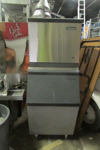 Ice maker with bin, scotsman cme506ws-1f, water cooled great condt. 337 944 9316 for sale