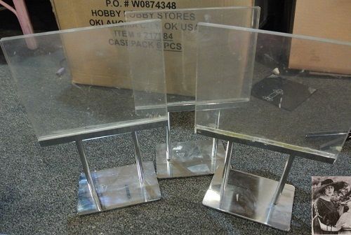1 used clear acrylic lucite sign holder 5&#034;x 7&#034; 10&#034; tall retail silver metal base for sale