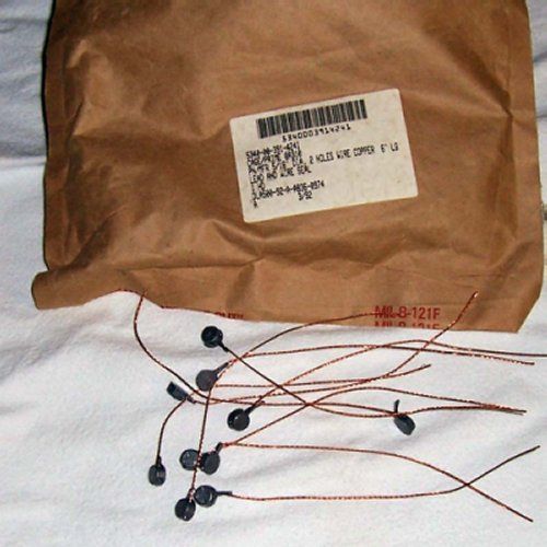 LEAD &amp; WIRE SEALS USED FOR MILITARY SECURITY ITEMS .