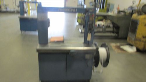 Overstrapping 515 strapping machine used for sale