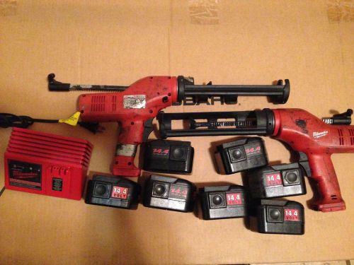 Milwaukee power caulk gun with charger, 7 batteries 14.4v plus 1 for parts