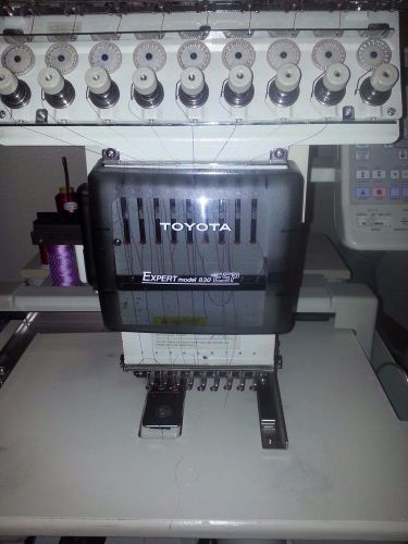 Toyota AD 830 9 Needle Embroidery Machine-Used Machine in Working Condition