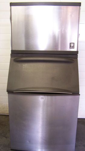 Nice used manitowoc qy0455w ice machine with a 570  bin for sale